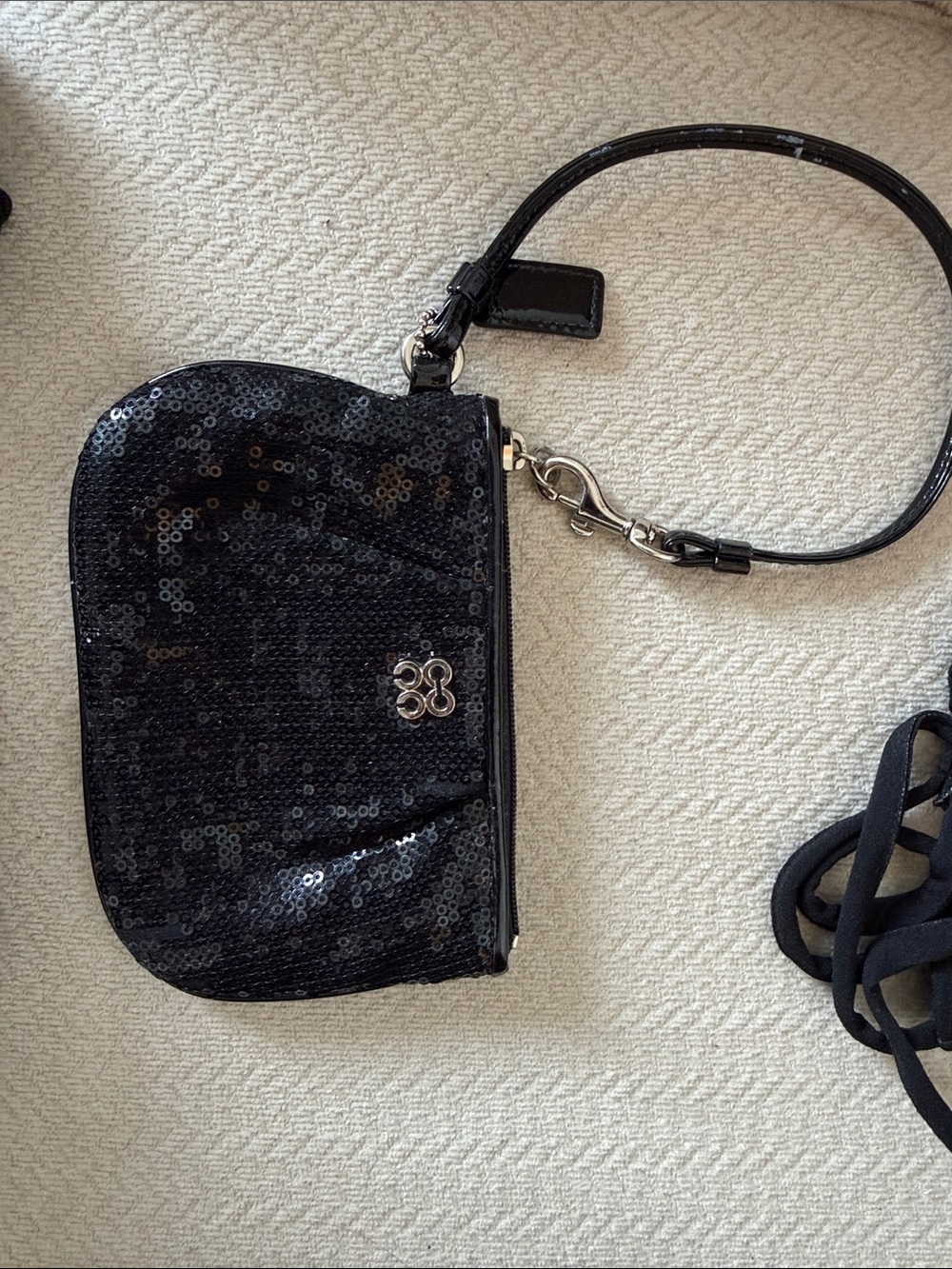 Black Sequin Wristlet with Silver Coach Logo